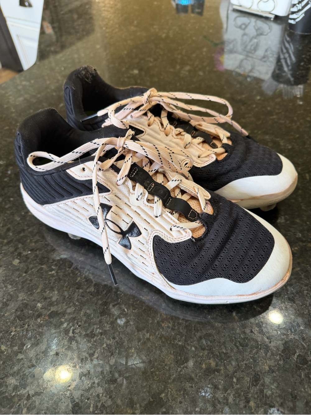 Under Armour Black and Beige Athletic Cleats